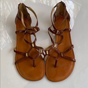 Fergie brown sandals with brass decoration